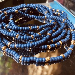 Mat bl med 24 k forgyldte Delixa perler